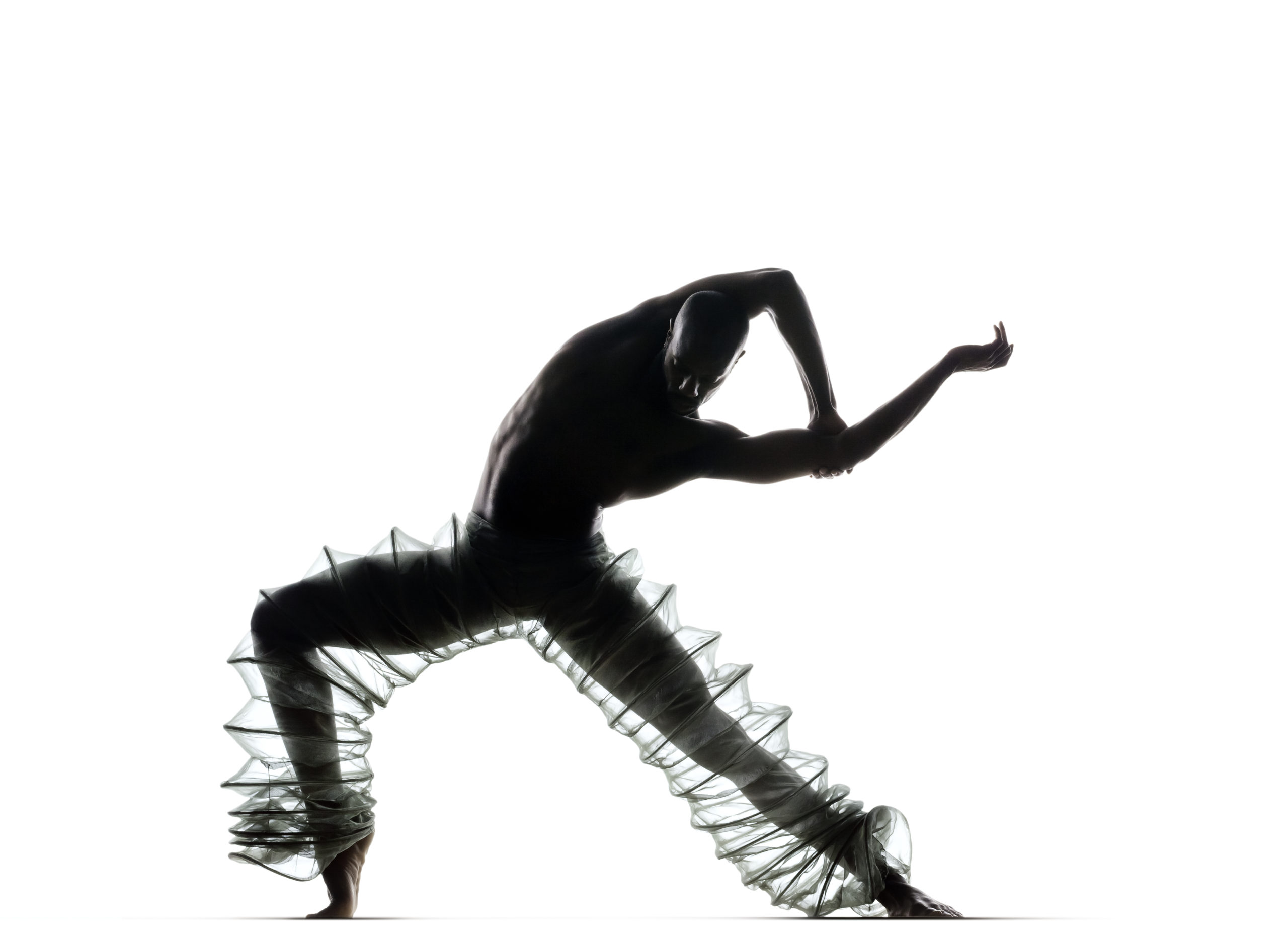Company Dancer Keelan Whitmore lunging sideways