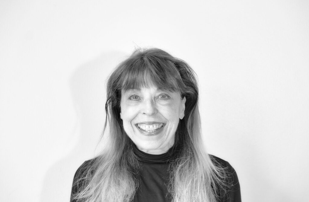 Lynn Brilhante's headshot in black and white