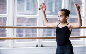 A young dancer working in the studio