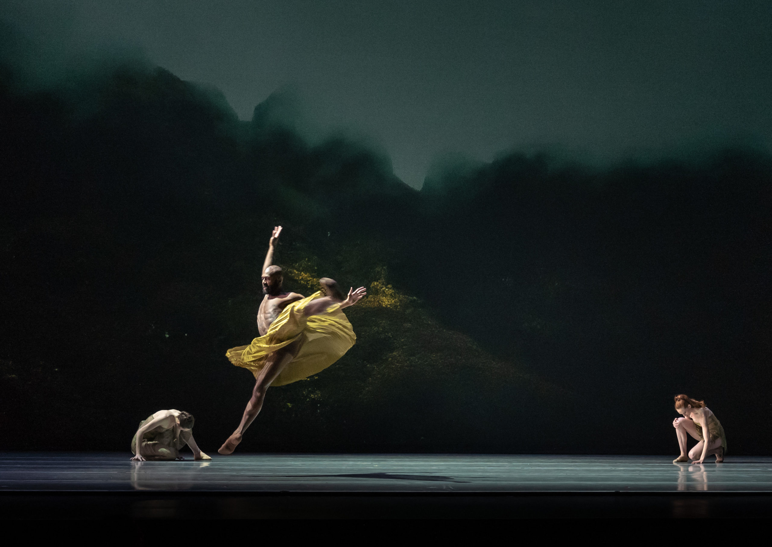 LINES Ballet company artist Madeline DeVries, Maya Harr, and Babatunji Johnson performing on stage in Alonzo King's POLE STAR