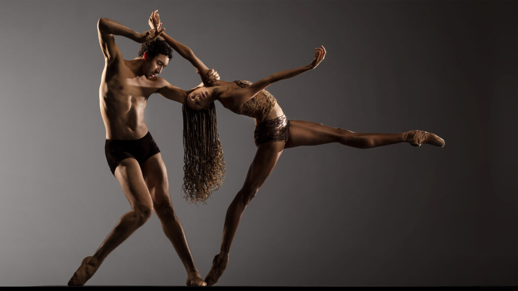 LINES Ballet company artists Adji Cissoko and Shuaib Elhassan partnering, Adji en pointe
