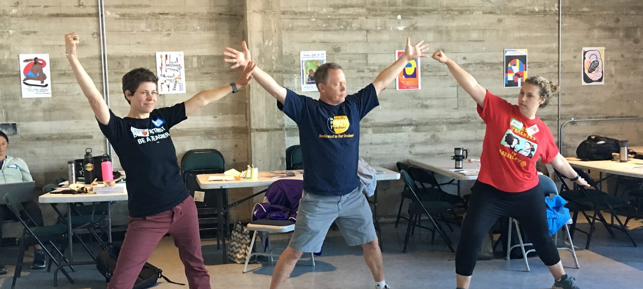 Teachers from the Berkeley Unified School District dancing at a LINES Professional Development Workshop