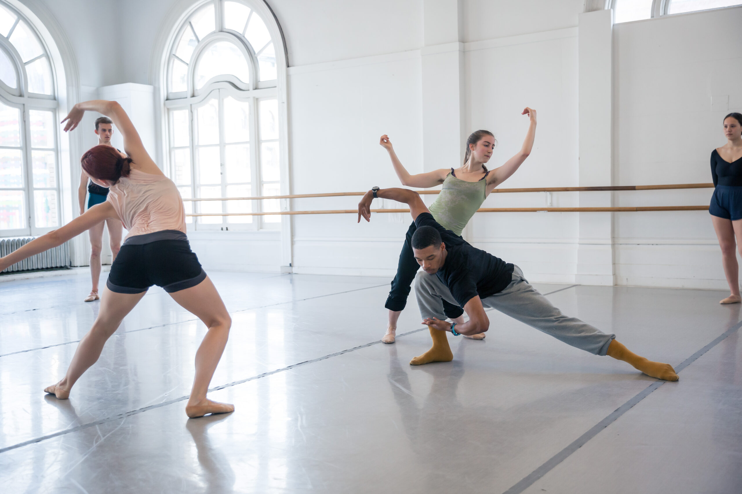 LINES Ballet Training Program students dancing in a studio at LINES Dance Center