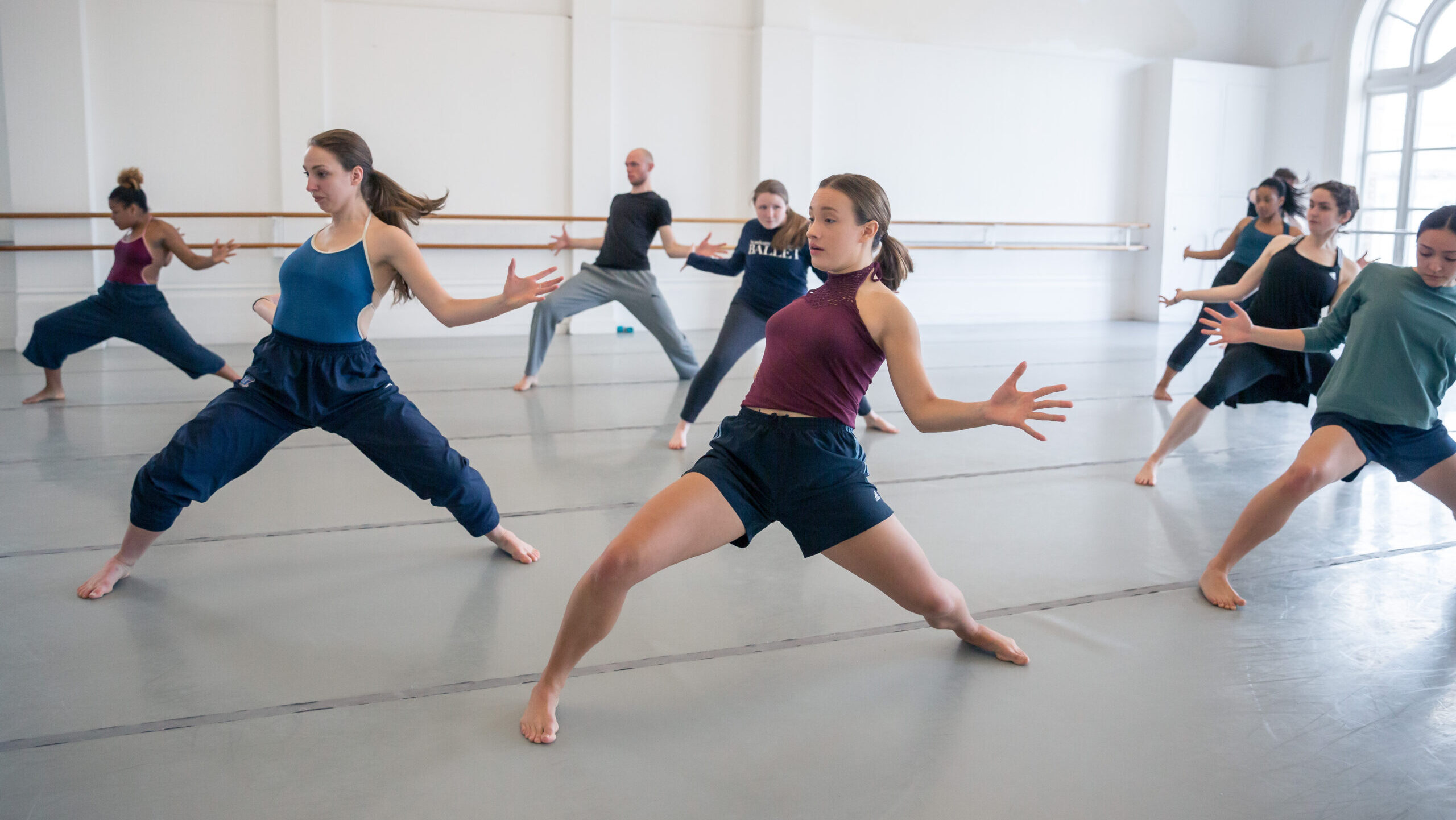 LINES Ballet BFA at Dominican students dancing in unison in a studio at LINES Dance Center