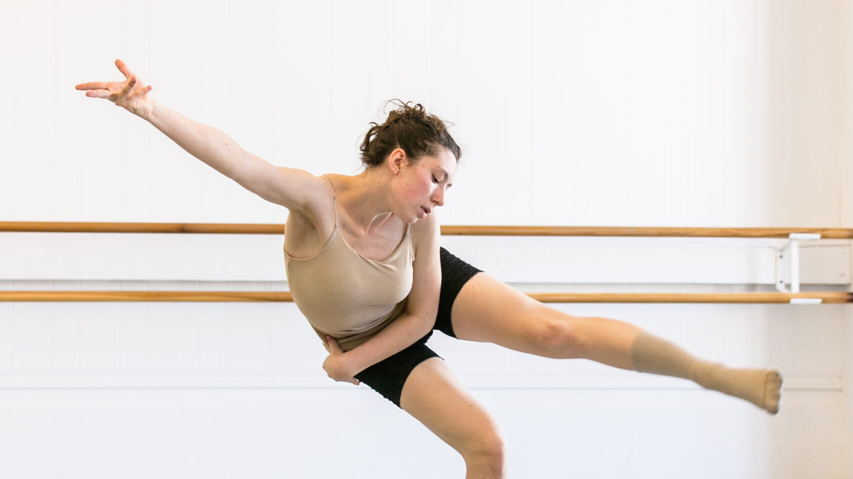 Former BFA at Dominican student dancing in a studio at LINES Dance Center