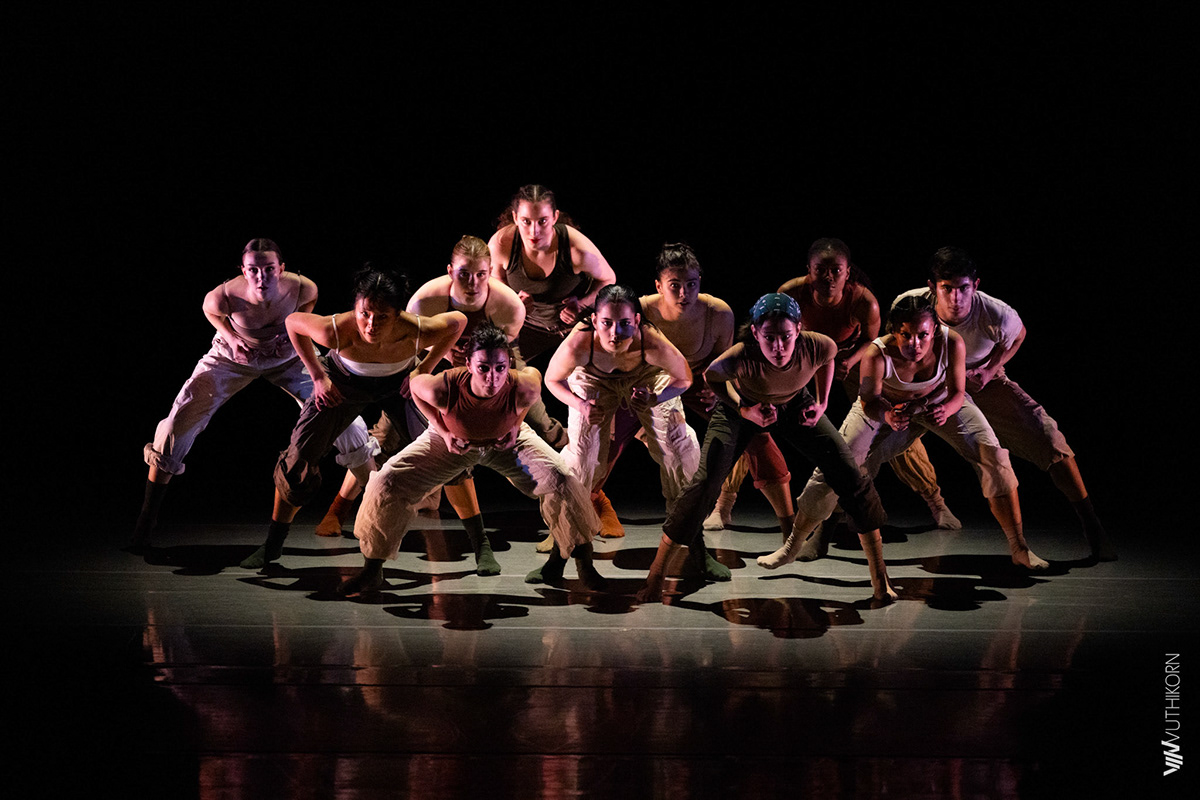 LINES Ballet Training Program students performing a work on stage choreographed by Alejandro Perez while wearing earth tones